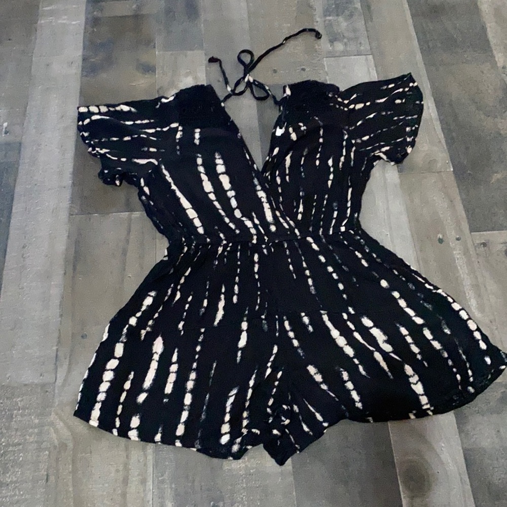 Cute little romper with tie v-back!